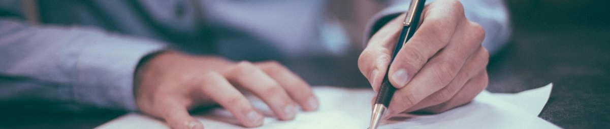 Hand Signing Paper